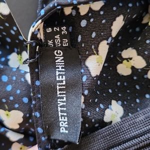 Brand new never been worn PrettyLittleThing dress. Size 2 women's
